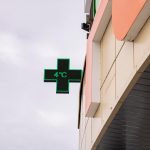green-cross-pharmacy-sign-on-a-building_457211-7058.jpg