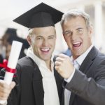 Father and graduate son celebrating