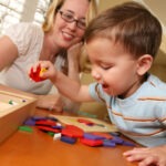 mom-and-toddler-playing-with-blocks