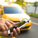 Man orders a taxi from his cell phone