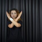 young-girl-crossed-her-arms-gesture-stop-high-quality-photo_2831-9522