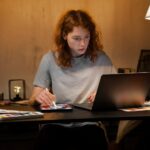 front-view-woman-drawing-tablet_23-2150040124