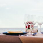 romantic-dining-table-setting-with-wine-glass-other_74190-6246
