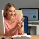 business-woman-texting-private-messages-her-workplace_1098-18752