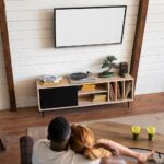 couple-watching-streaming-service-together-living-room_23-2149026111